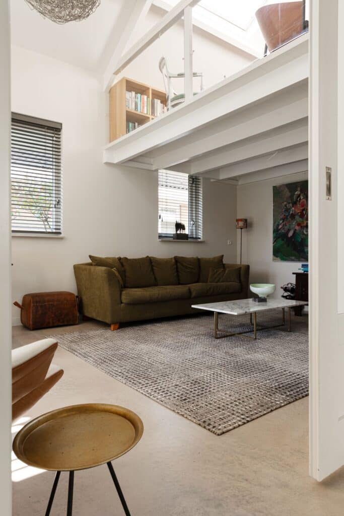 Italiaanse betonlookvloer Nijmegen woonkamer