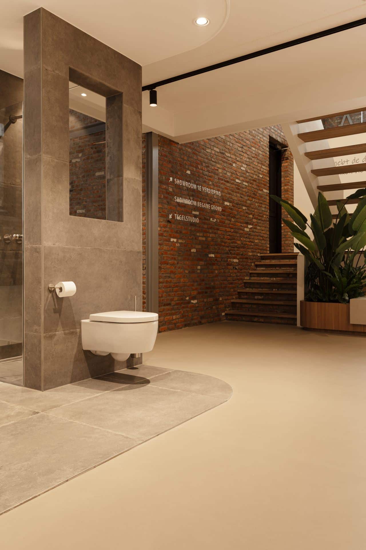 lavasteen gietvloer badkamer showroom dodewaard